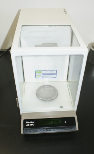 Mettler AE100 Mettler AE-100 Analytical Balance Mettler AE100 Analytical Balance Mettler AE-100 FOUR PLACE ANALYTICAL BALANCE 100 grams x 0.1mg used nice with power cord